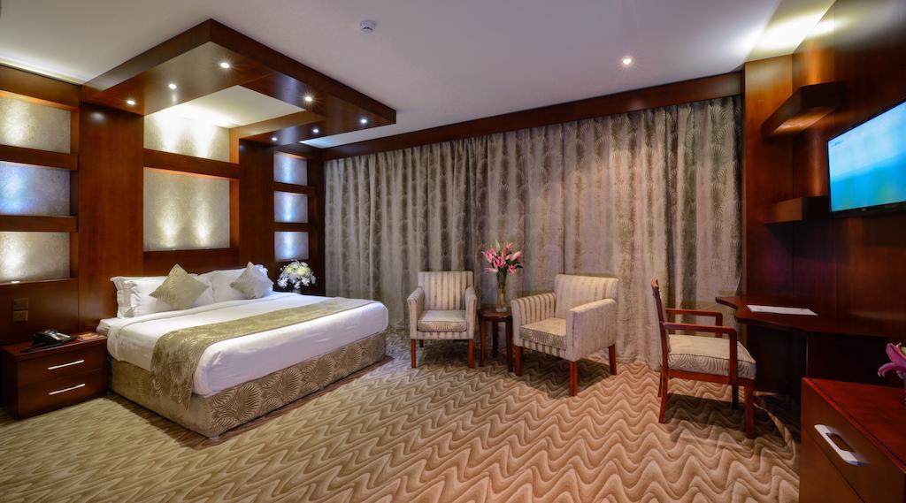 Hotel Haven Plaza Rijád Pokoj fotografie